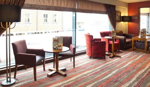 Lounge seating with a view out of the window inside Thyme restaurant