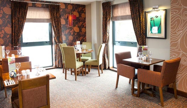 Small tables inside Thyme restaurant inside Premier Inn Camberley