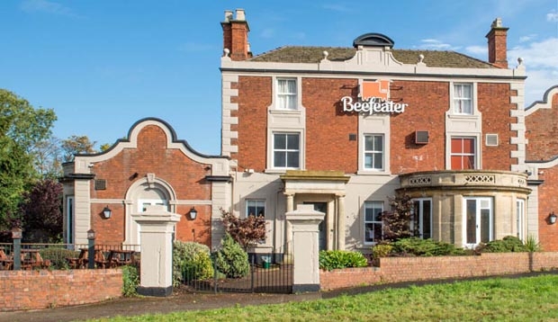 View of refurbished Beefeater restaurant next to Premier Inn Cannock South hotel from the front.