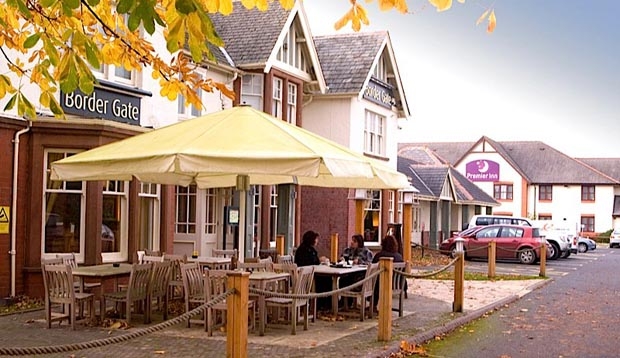 Outside of Boarder Gate restaurant with Premier Inn Carlisle hotel in the background.