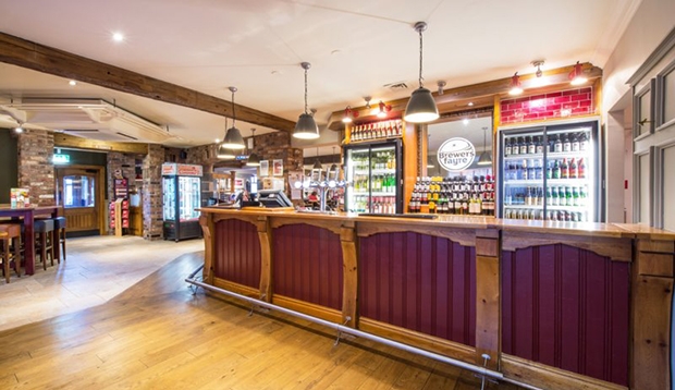 Bar area inside Btewers Fayre restaurant adjacent to Premier Inn Chesterfield hotel