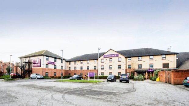 Premier Inn Chesterfield North hotel - view from the road showing lots of free parking spaces outside