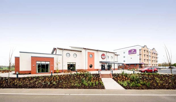 Exterior of Premier Inn Cleethorpes from far away with brewers fayre sign visible