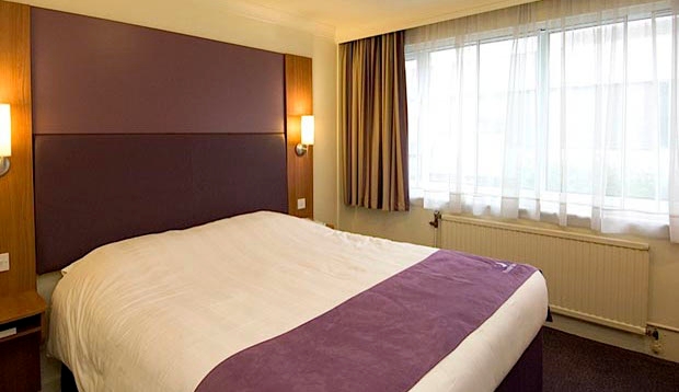 Bedroom at Premier Inn Cardiff North