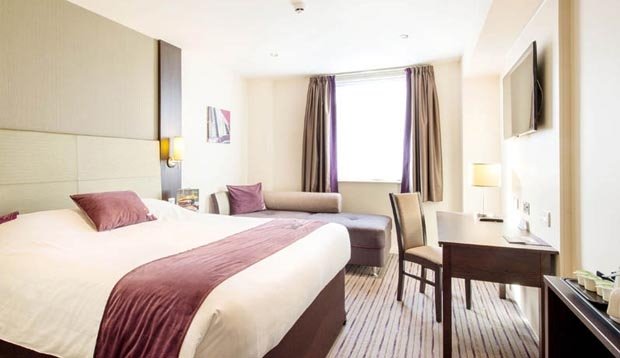 Double bedroom at Premier Inn Eastbourne Town Centre with king-size Hypnos bed