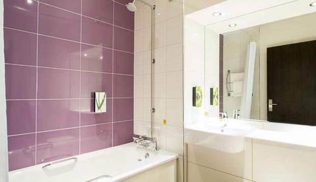 En-suite bathroom with purple tiles at Eastbourne hotel Premier Inn