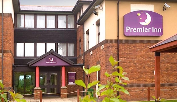 Exterior of Premier Inn Livingston (M8, Jct3) hotel with Premier Inn sign at forefront