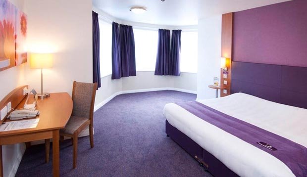 How do you book rooms at Premier Inn Hotels?