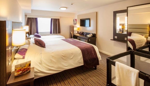 Family room layout in Premier Inn London Hackney hotel with pull out bed for kids plus cot