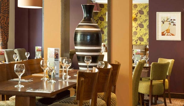 Restaurant area with tables set at Premier Inn London Southwark (Tate Modern) hotel