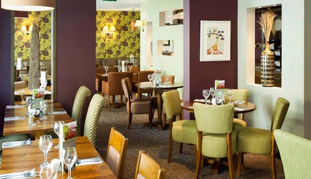 Restaurant area with tables set at Premier Inn London Southwark (Tate Modern) hotel