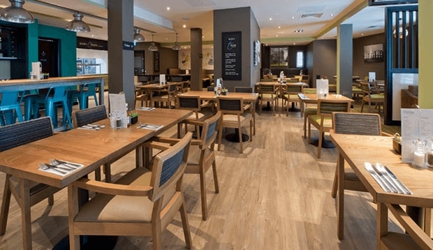 Tables set out in Thyme restaurant at Premier Inn Tottenham Hale
