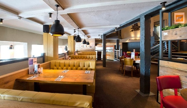 Restaurant area at Premier Inn Maidstone (Sandling) hotel showing seating