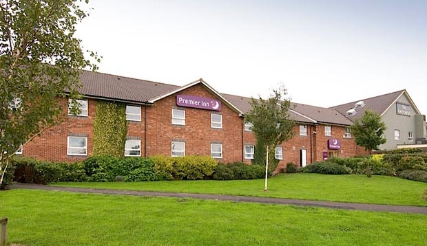Exterior at Premier Inn Uttoxeter showing gardens