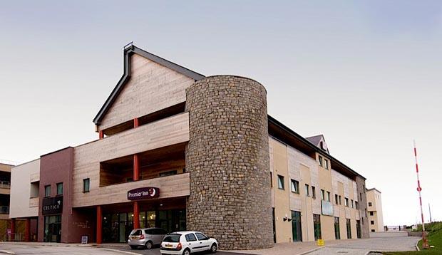 Exterior of Premier Inn Hotel Caenarfon Victoria Dock showing car park