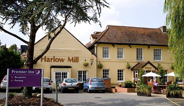 Exterior at Premier Inn Harlow showing car park and restaurant