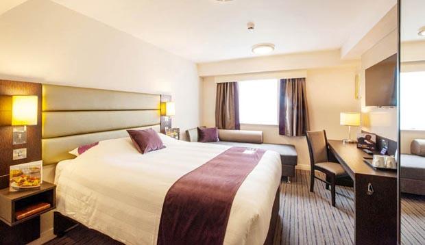 Bedroom inside Premier Inn Hackney hotel with king size Hypnos bed