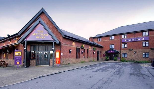 Exterior of Premier Inn Manchester (Hyde) hotel showing reception
