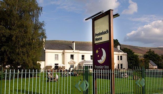 Exterior at Premier Inn Merthyr Tydfil hotel showing gardens