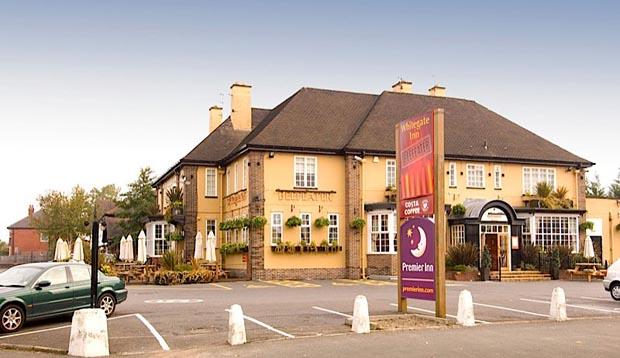 Exterior of Premier Inn Oldham (Broadway) showing car park