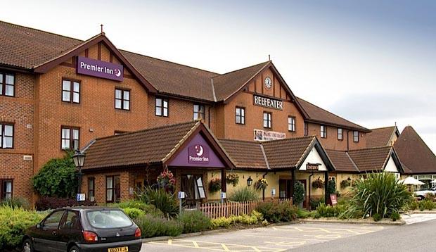 Exterior of Premier Inn York North West showing car park