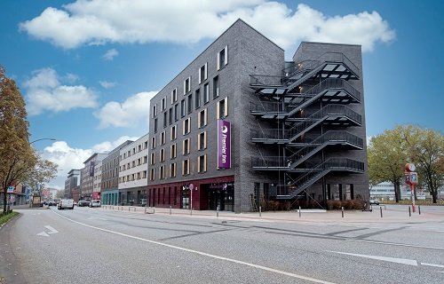 Why has Premier Inn opened hotels in Germany?
