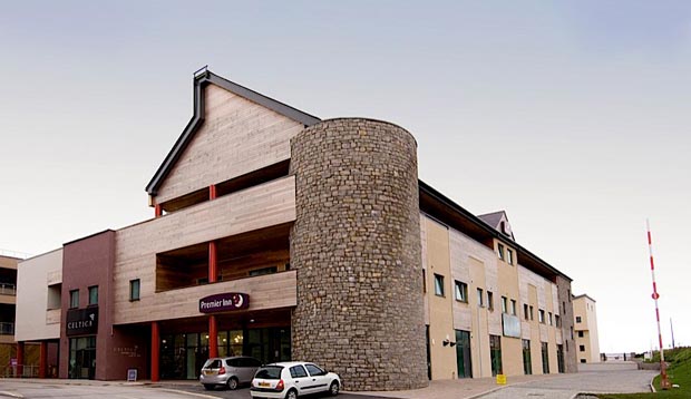 Exterior of Premier Inn Hotel Caenarfon Victoria Dock showing car park