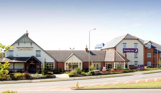 Exterior of Premier Inn Cannock with restaurant