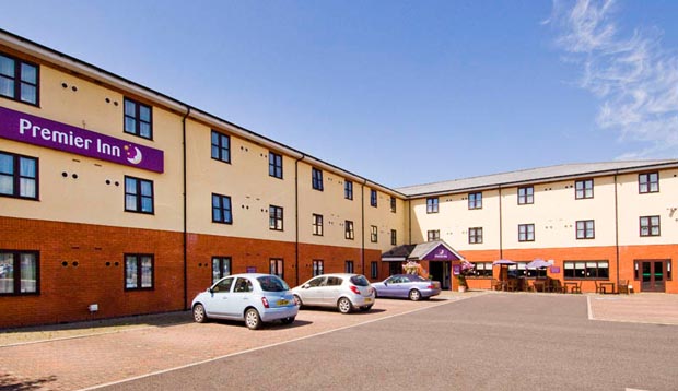 Exterior of Premier Inn Hotel Chichester showing carpark