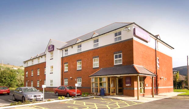 Exterior of Premier Inn Ebbw Vale showing car park and reception