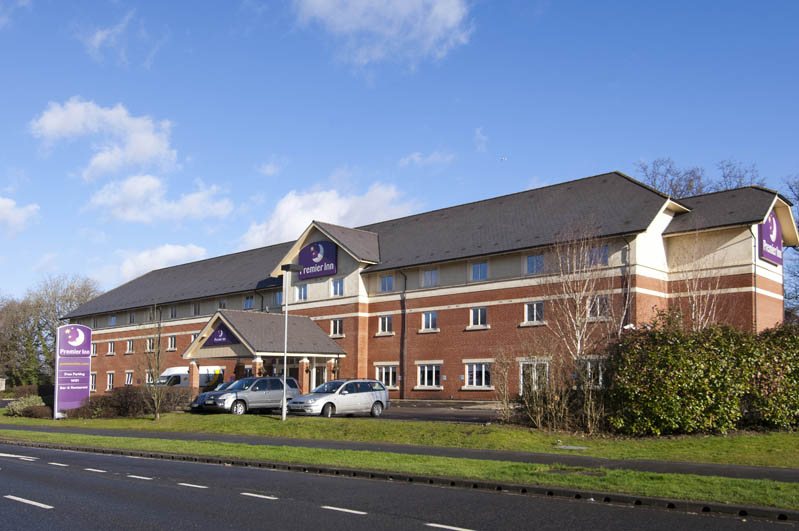 Exterior at Premier Inn Gatwick Crawley Town West showing car park and surrounding area