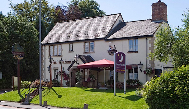 Exterior at Premier Inn Glasgow (Bearsden) showing gardens