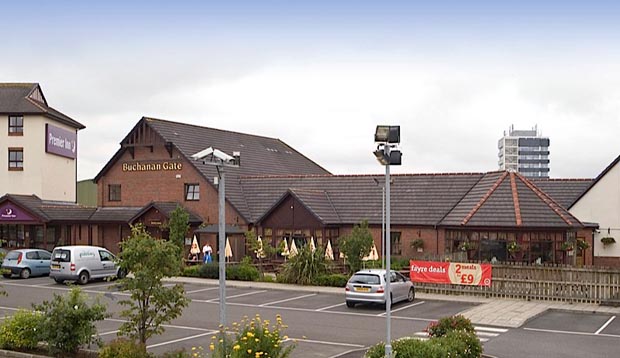 Exterior of Premier Inn Glasgow Stepps (M80, J3) showing car park