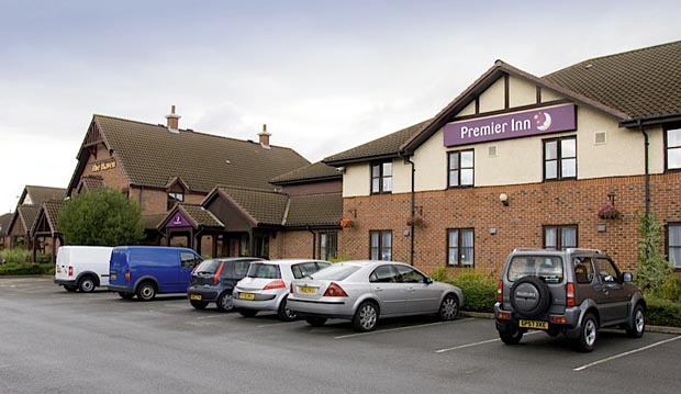 Exterior of Premier Inn Grimsby showing car park
