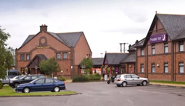Car park area and exterior at Premier Inn Inverness East