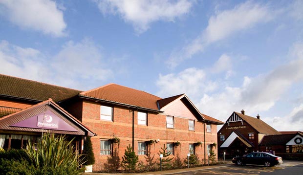 Exterior of Premier Inn Kings Lynn showing car park