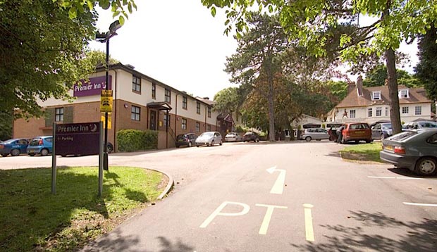 Exterior of Premier Inn Kings Langley showing drive and car park