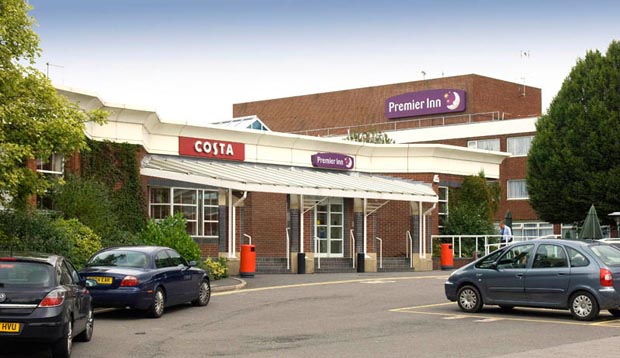 Car park and exterior of Premier Inn Leicester Fosse Park hotel