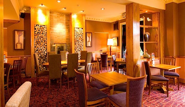 Restaurant area at Premier Inn Liverpool (Roby) hotel