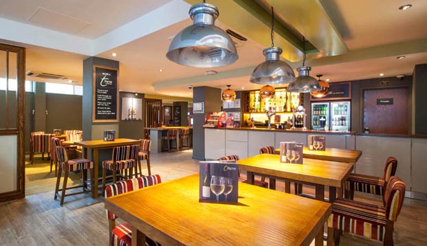 Bar area at London Hammersmith hotel with restaurant view