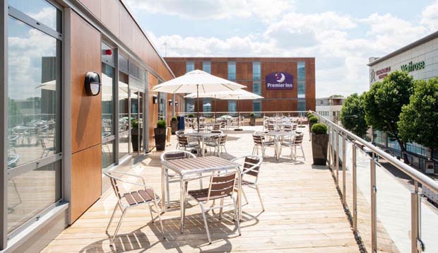 Exterior of Premier Inn London Wandsworth hotel showing restaurant area 