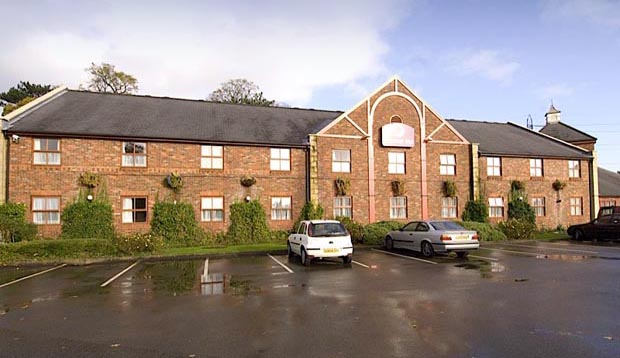 Car park and exterior at Premier Inn Macclesfield North hotel