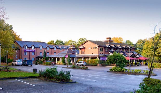 Exterior at Premier Inn Manchester (Wilmslow) hotel showing car park