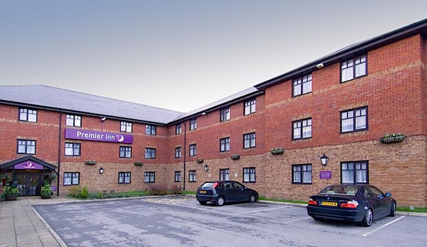 Car park and exterior of Premier Inn Manchester (Hyde) hotel