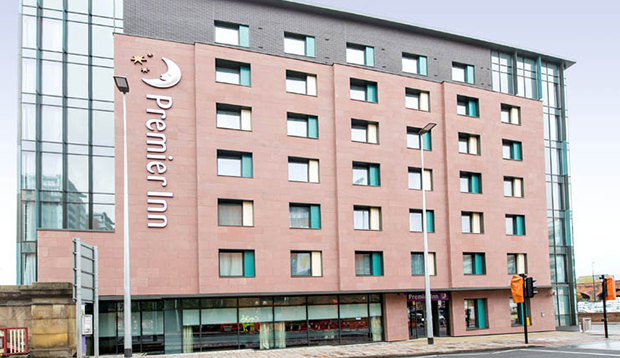 Street view of outside Premier Inn hotel in Manchester