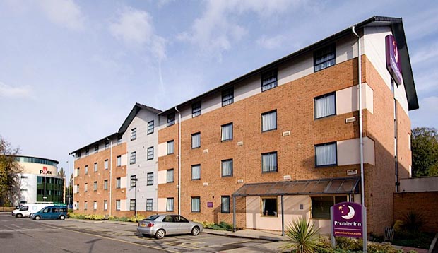 Exterior of Premier Inn Manchester West Didsbury showing car park