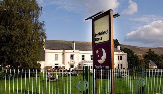 Exterior at Premier Inn Merthyr Tydfil hotel showing gardens