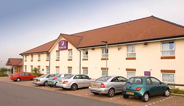 Exterior of Premier Inn Oldham Central showing car park
