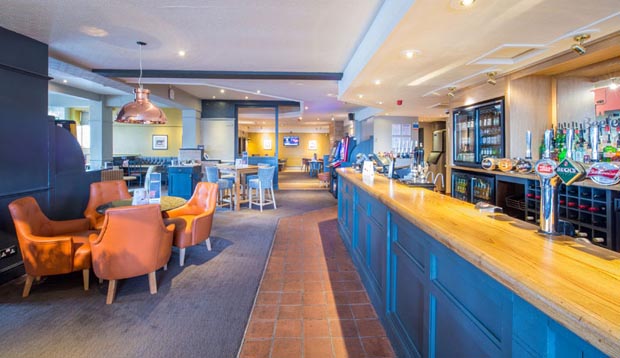 Coffee shop and bar area at Premier Inn Oldham (Broadway)