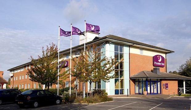 Exterior of Premier Inn Reading (Caversham Bridge) showing Premier Inn flags
